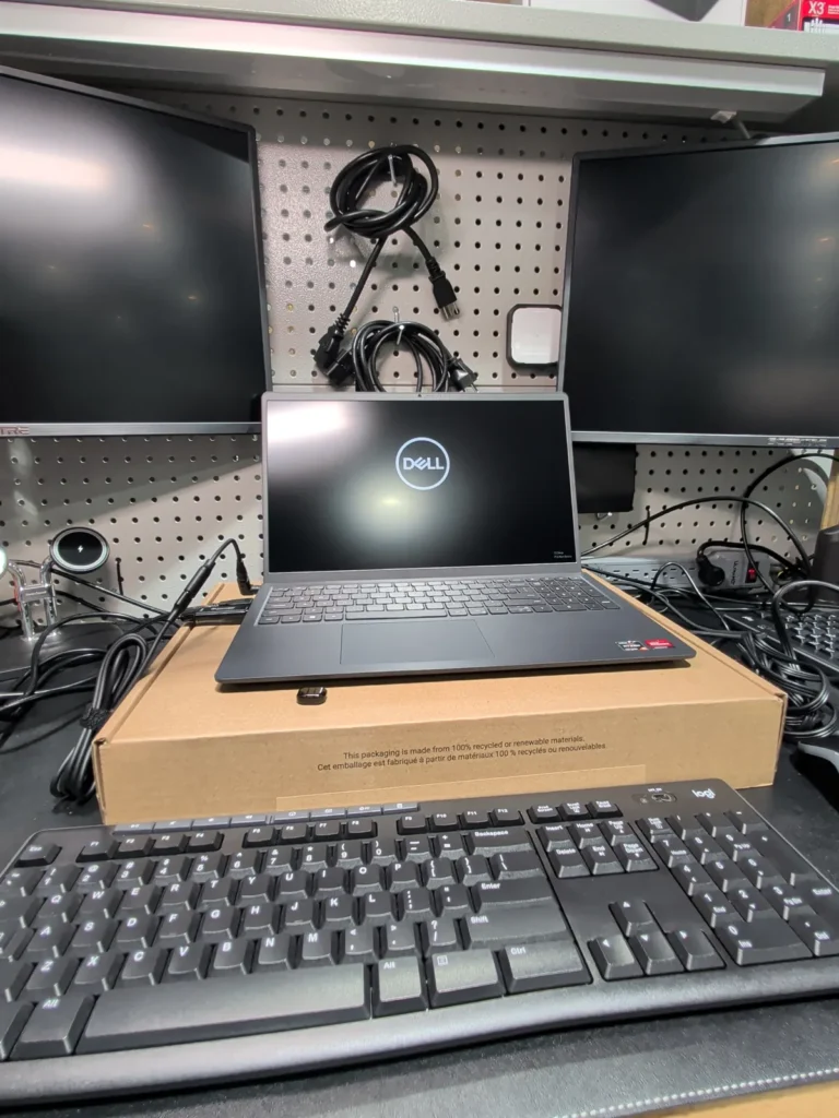 New Dell laptop being set up for a client